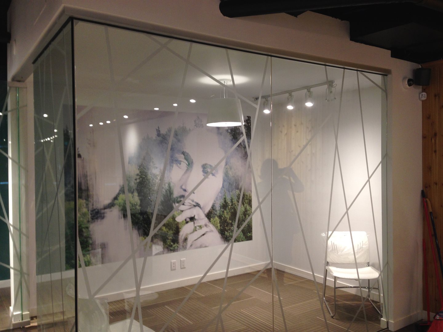 Signage Company Vancouver office with frosted film and etched glass privacy.