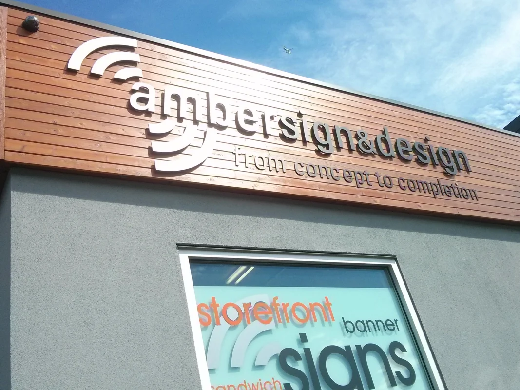 Custom real estate signage in Vancouver featuring Amber Sign & Design branding.